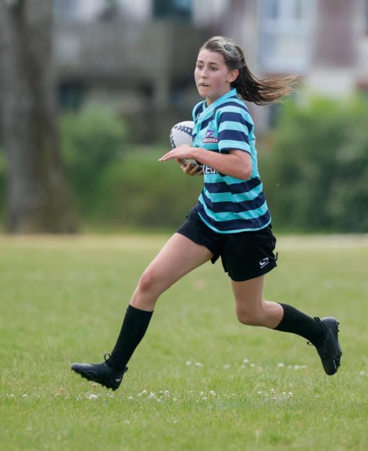 Daughter Mali on the burst in rugby